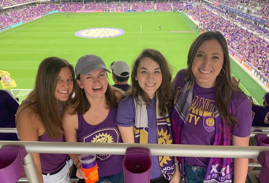 Alexis and friends at an Orlando City Soccer game